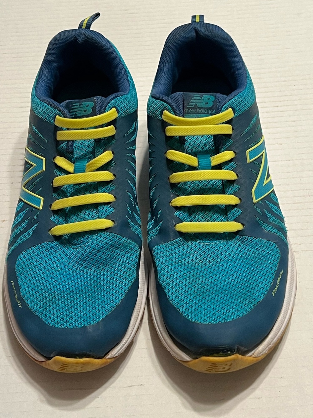 New Balance teal & yellow women’s running shoes